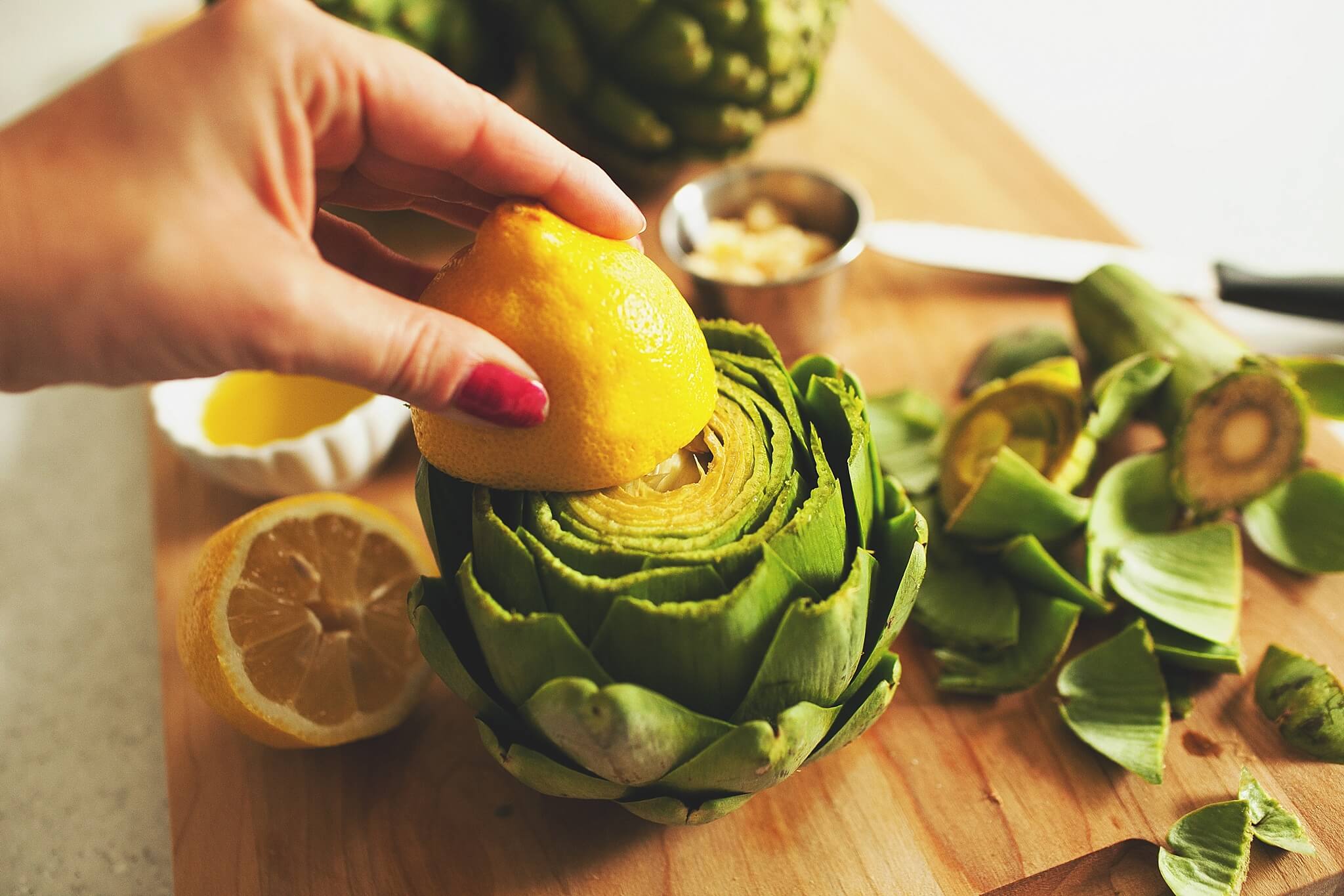 How to Cook Crockpot Artichokes - Step 4: rub with lemon