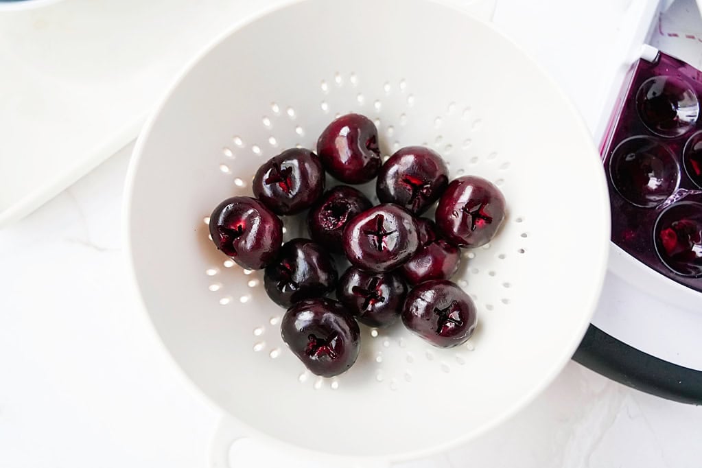 cherries in a colander