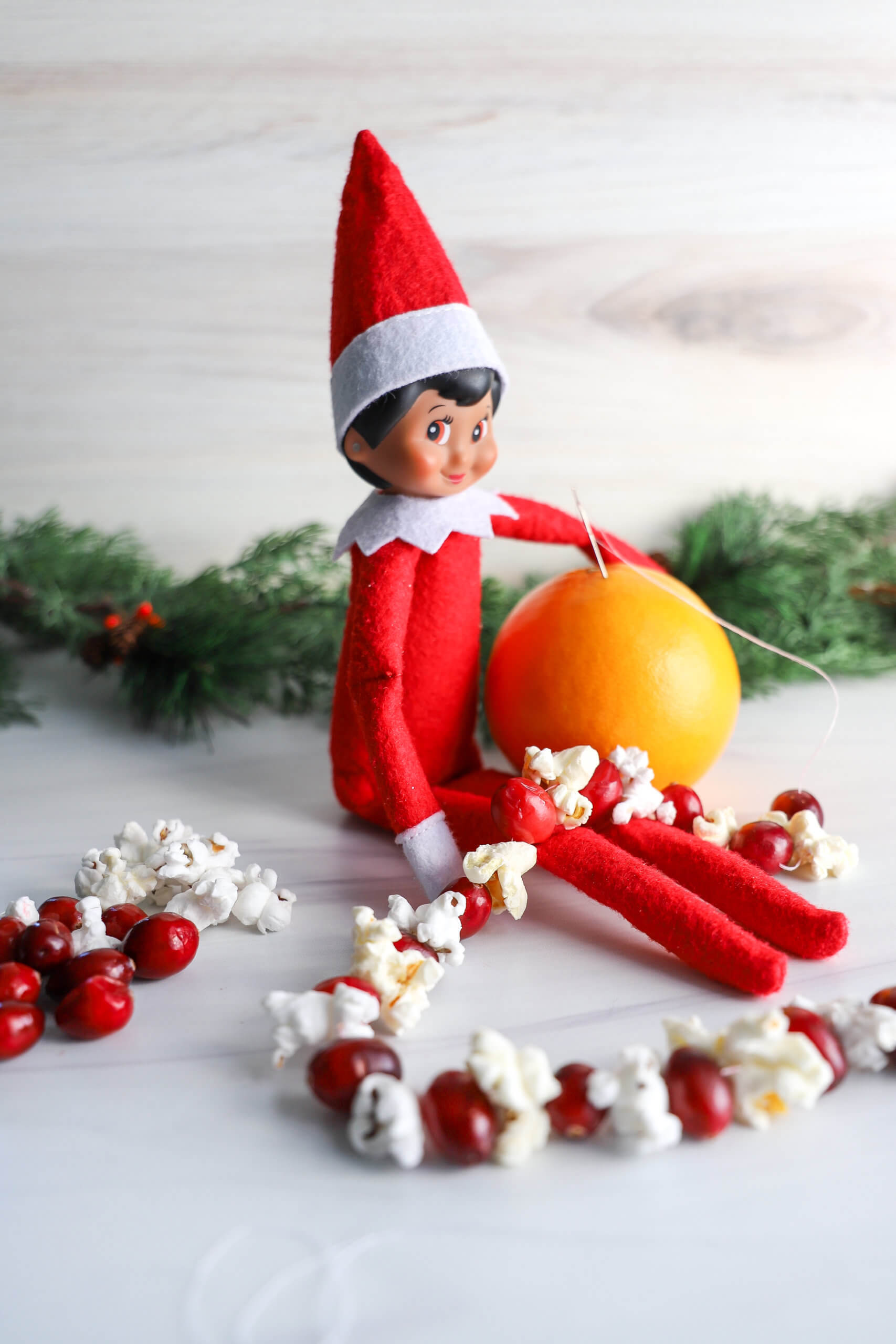 Easy Elf on the Shelf Ideas: Stringing Garland