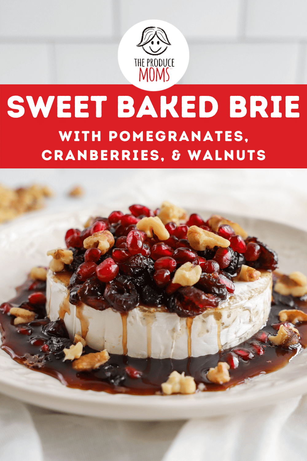 Sweet Baked Brie with Pomegranates, Cranberries, and Walnuts