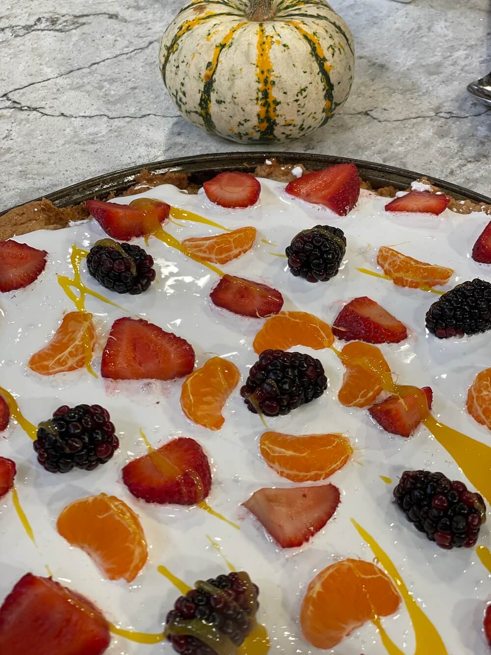 Cookie Pizza with Mango Icing