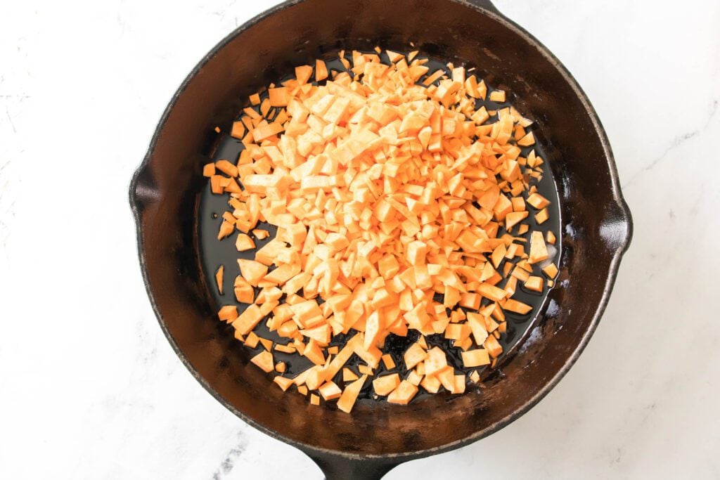 sweet potatoes in a cast iron skillet