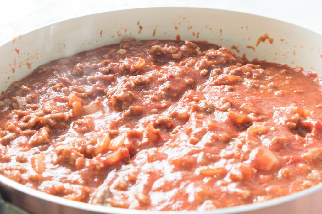meat sauce for slow cooker lasagna cooking in a pot