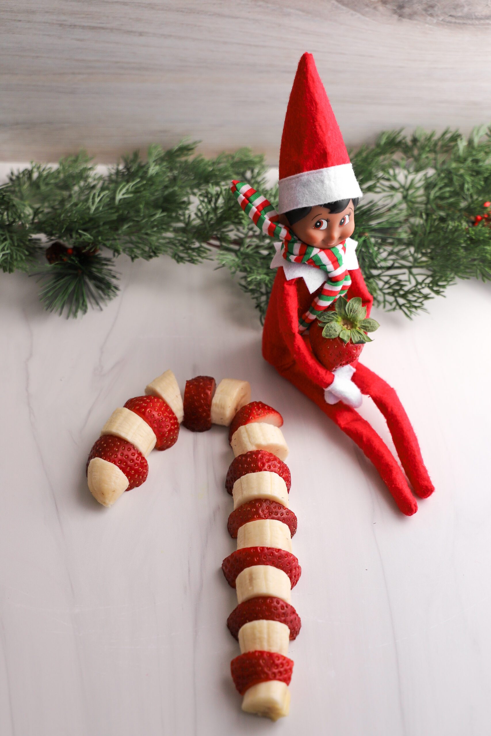 Elf makes a candycane snack