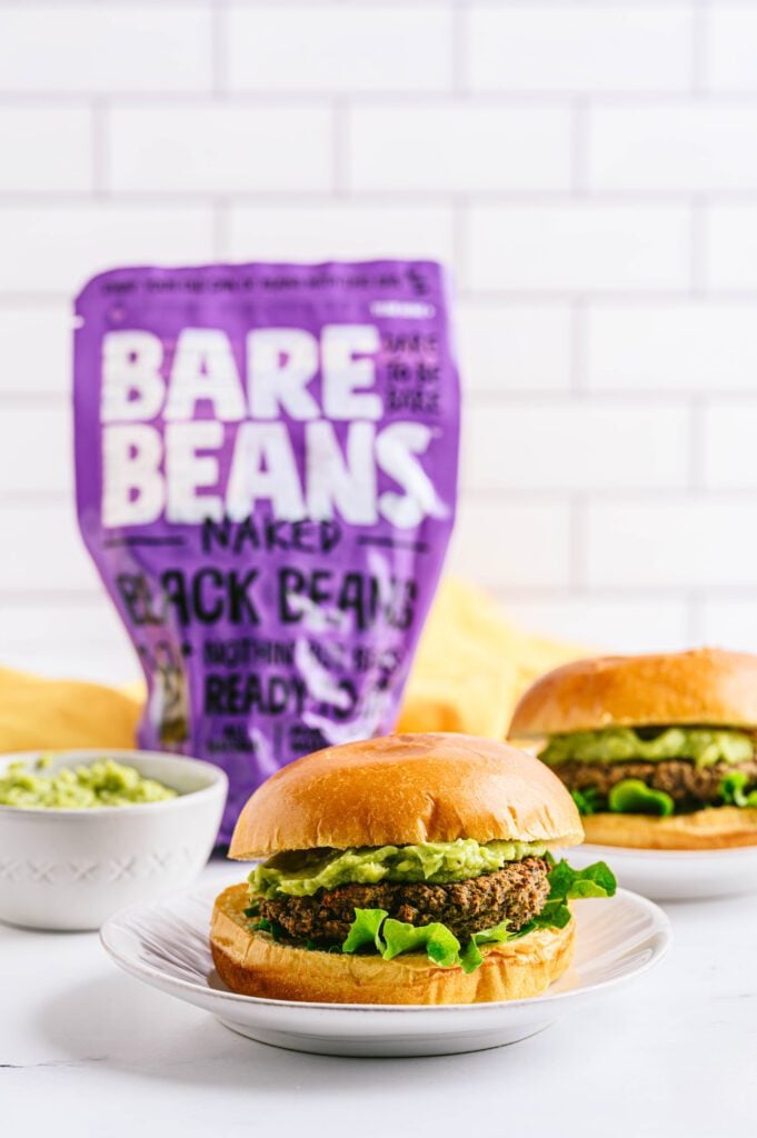 Black Bean Burgers with Guacamole and Bare Beans bag in the background