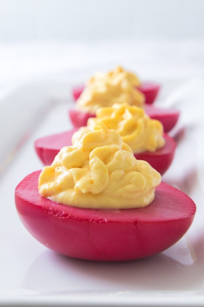 dye hard boiled eggs with beet juice - bright pink deviled eggs