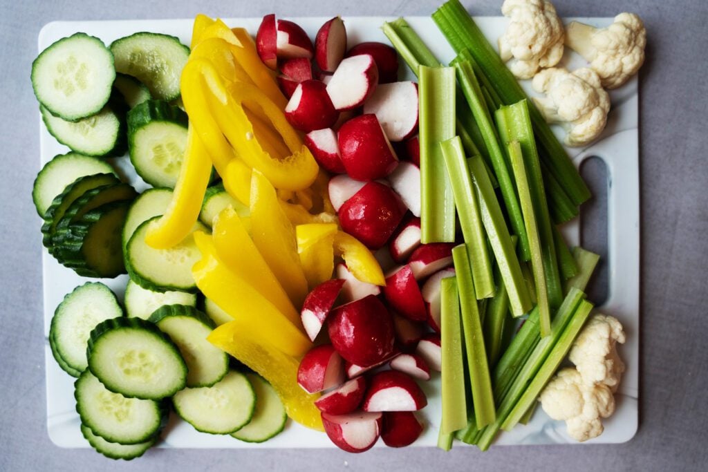 veggies sliced on a cutting board