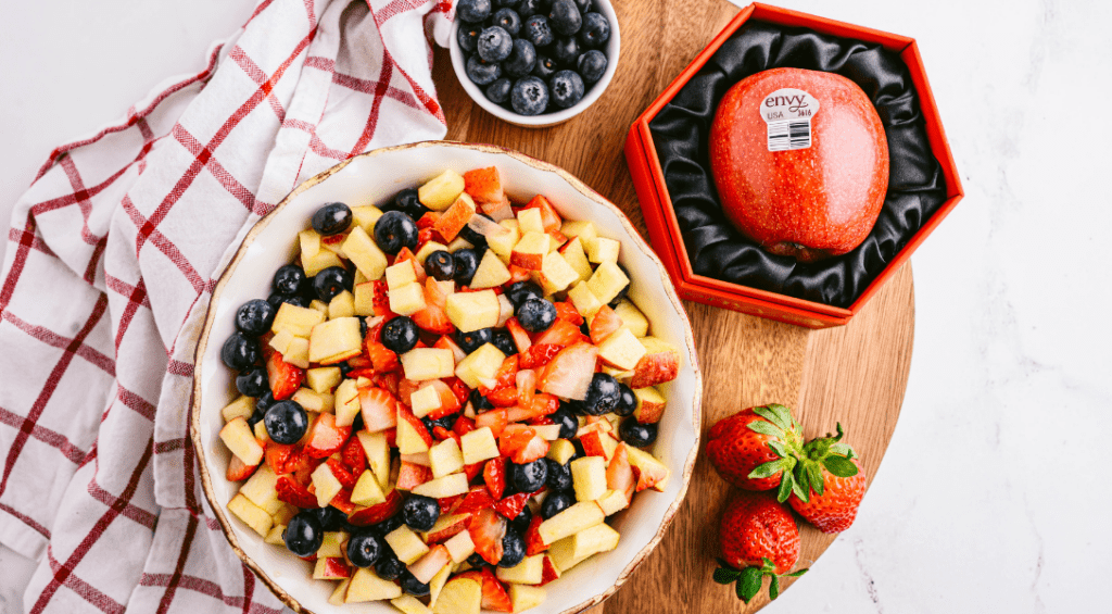 Apple Berry Salsa in a Bowl with apple, strawberries and blueberries