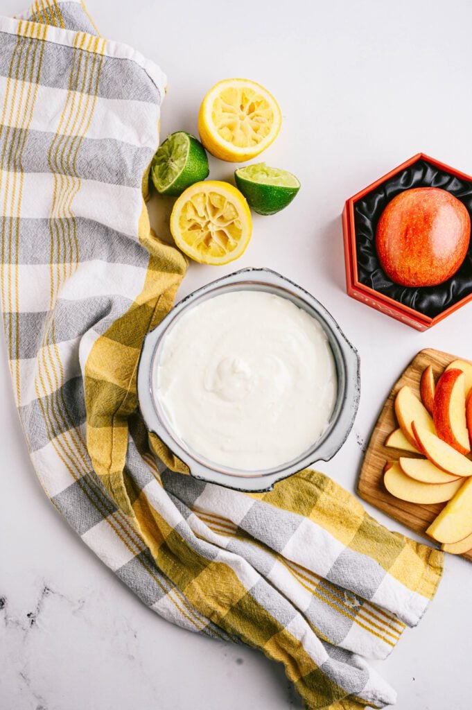 fruit dip with fruit around it 