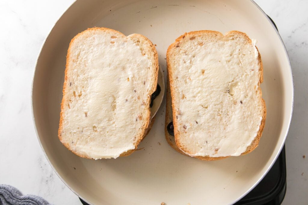 buttered bread on top of sandwich