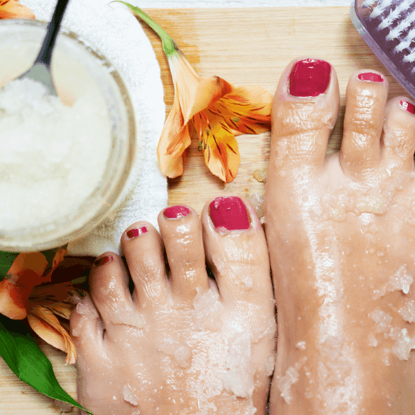 overhead view of foot scrub on feet