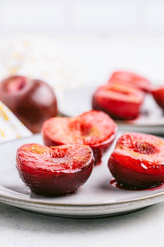 Roasted plums on a plate