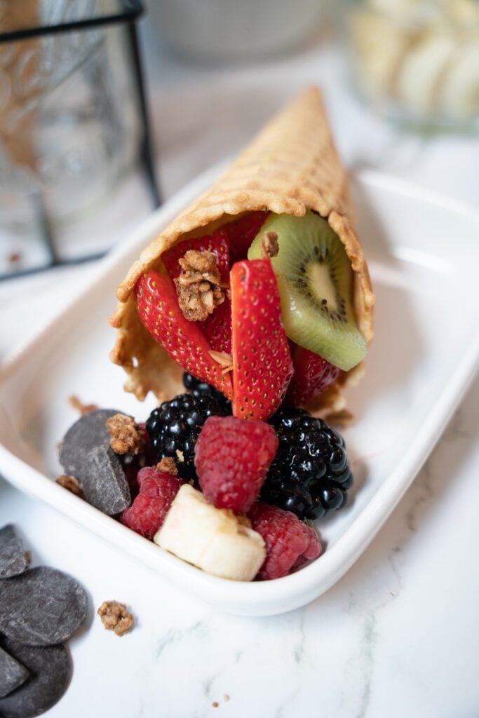 inside view of fruit salad in waffle cone