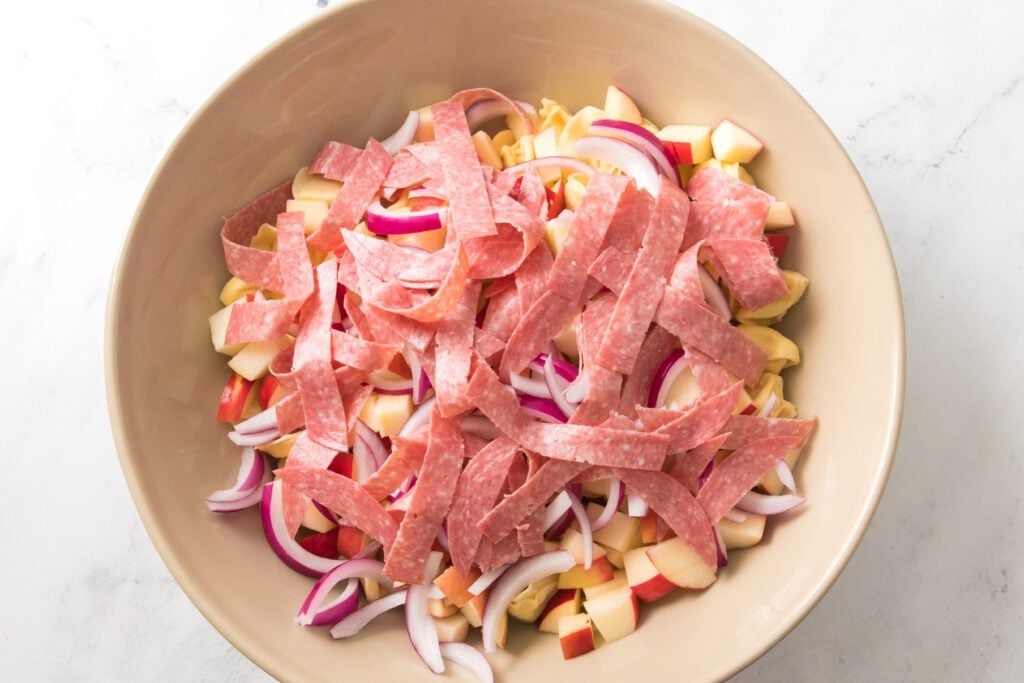 Adding ingredients to bowl