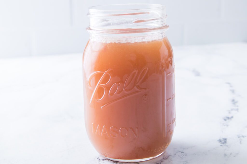 homemade apple juice in mason jar