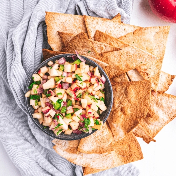 Overhead view of Apple salsa in bowl with tortillas chips