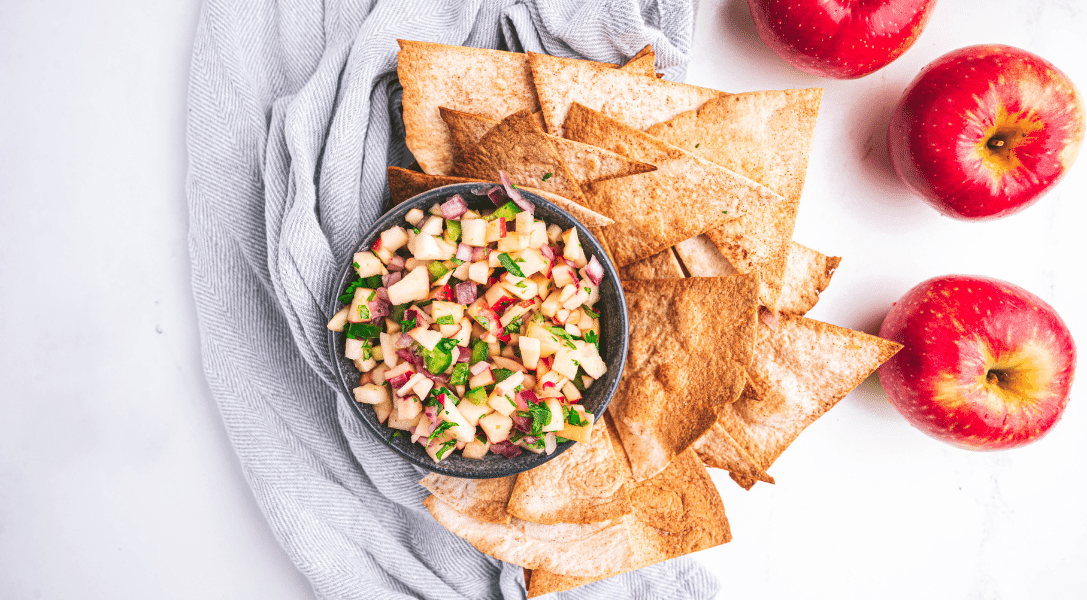 Overhead view of Apple salsa in bowl with tortillas chips