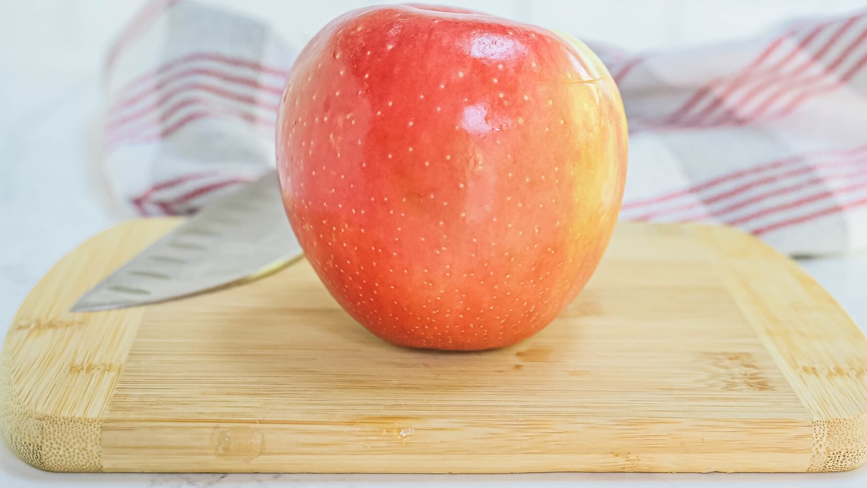 SweeTango apple on cutting board