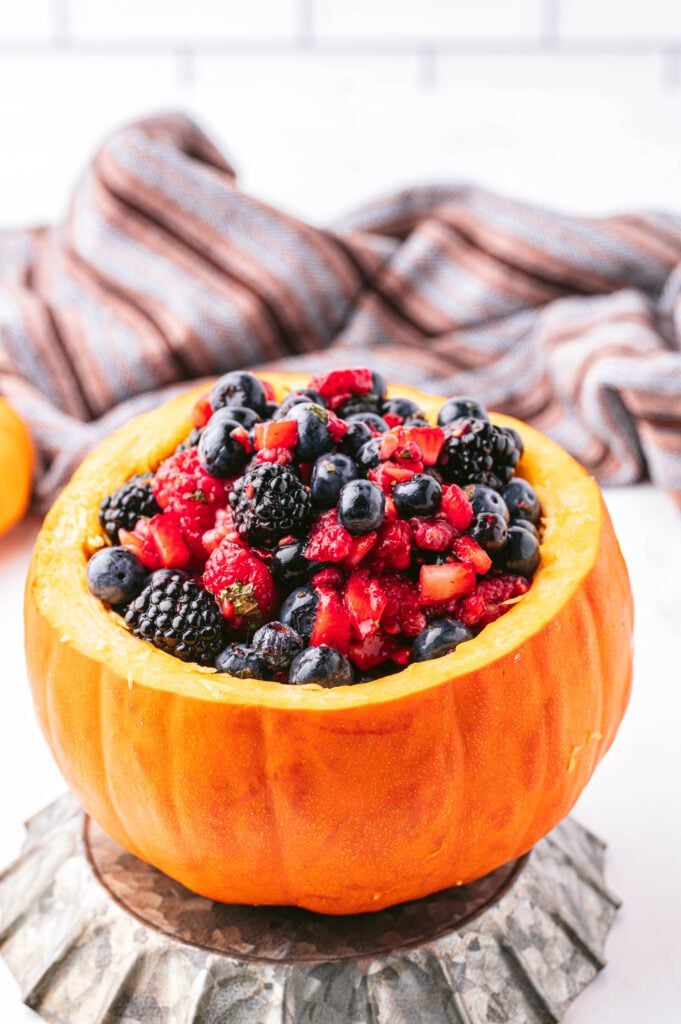 berry salad served in a pumpkin