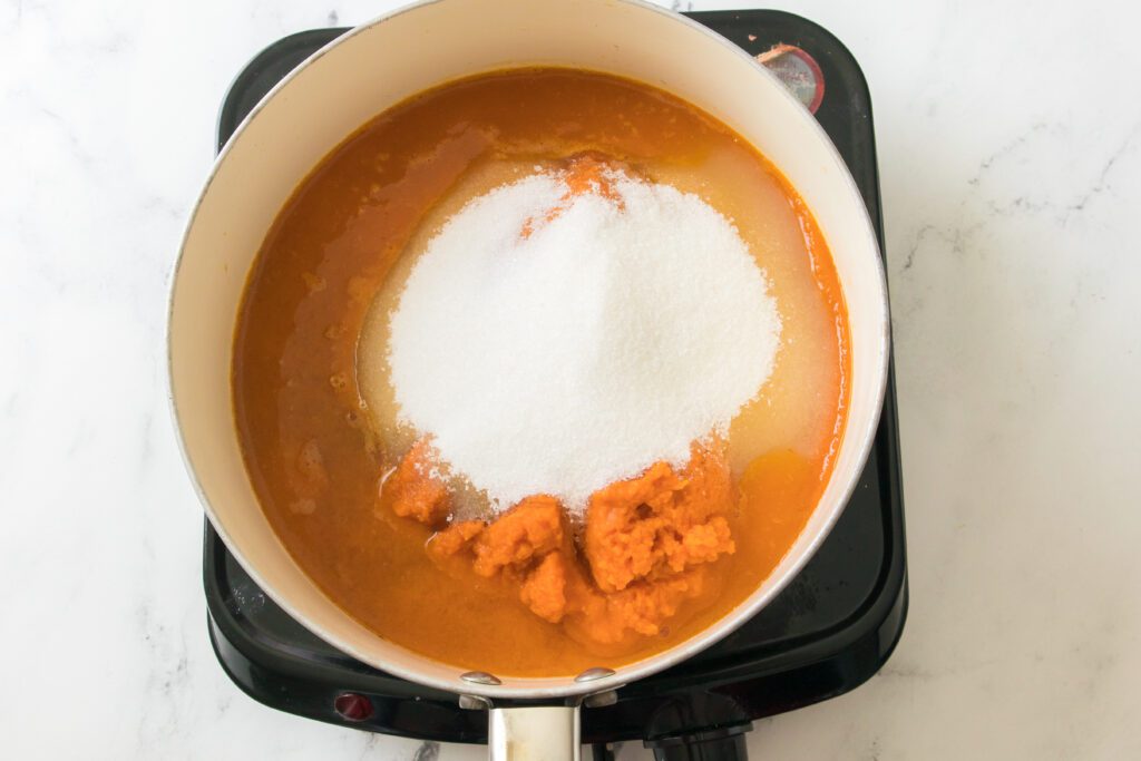ingredients for pumpkin butter in a saucepan