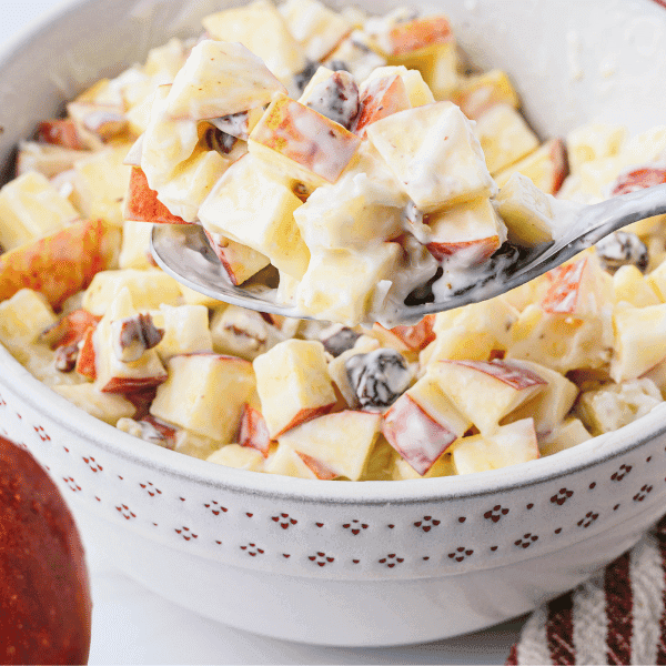 Mexican Apple Salad in bowl with Envy apple