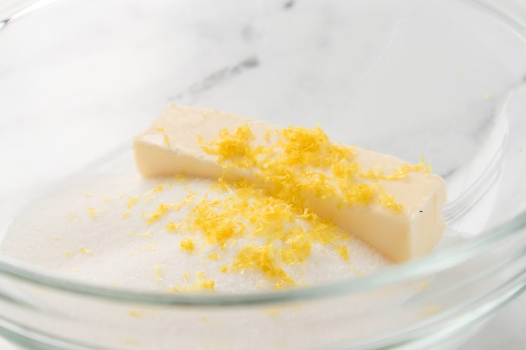 butter, sugar and lemon zest in glass bowl