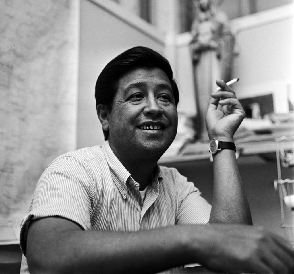 cesar chavez smoking a cigarette