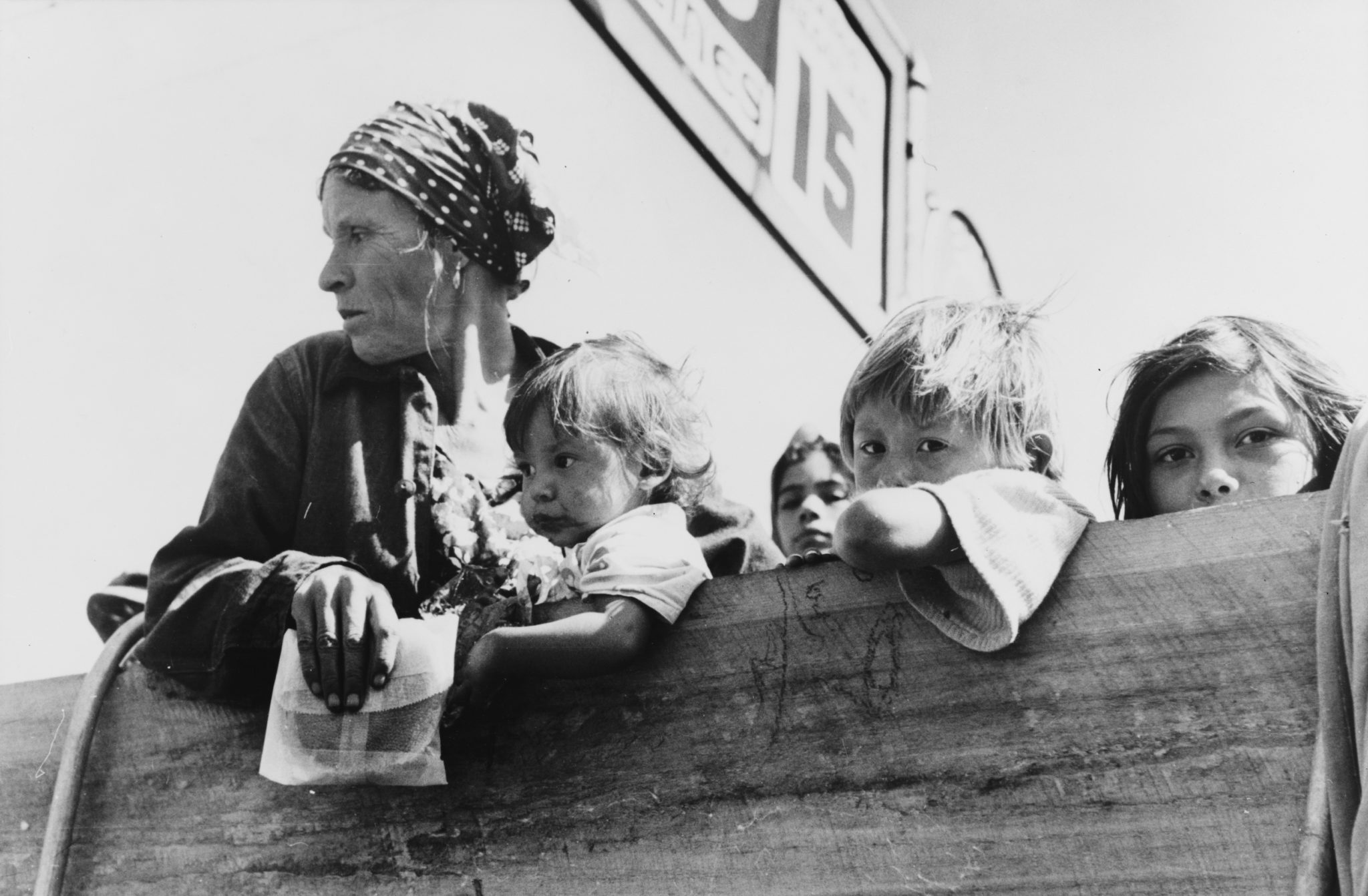 family on the back of a truck