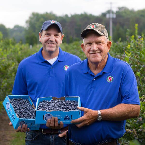 Brent + John Baumann in blueberry fields