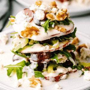 Stacked Apple Waldorf salad on White Plate