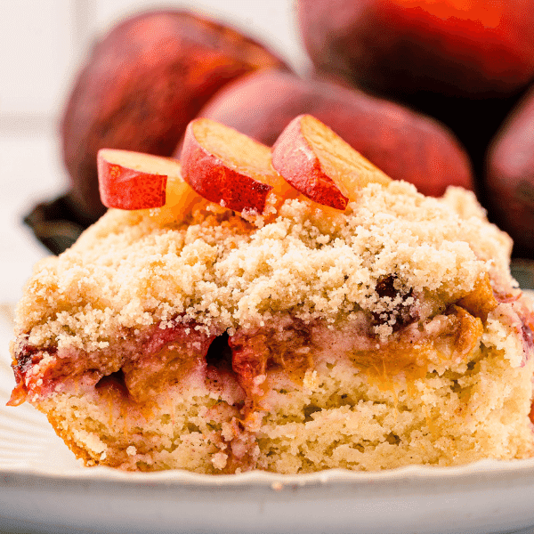Peach Coffee Cake with Peaches in background
