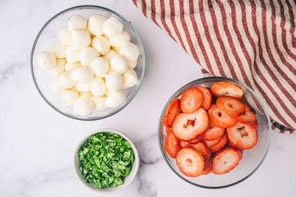 strawberries, basil, mozzarella pearls