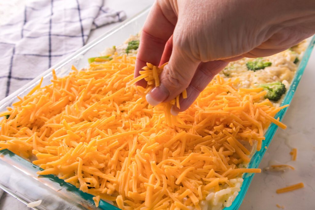 adding a layer of cheese
