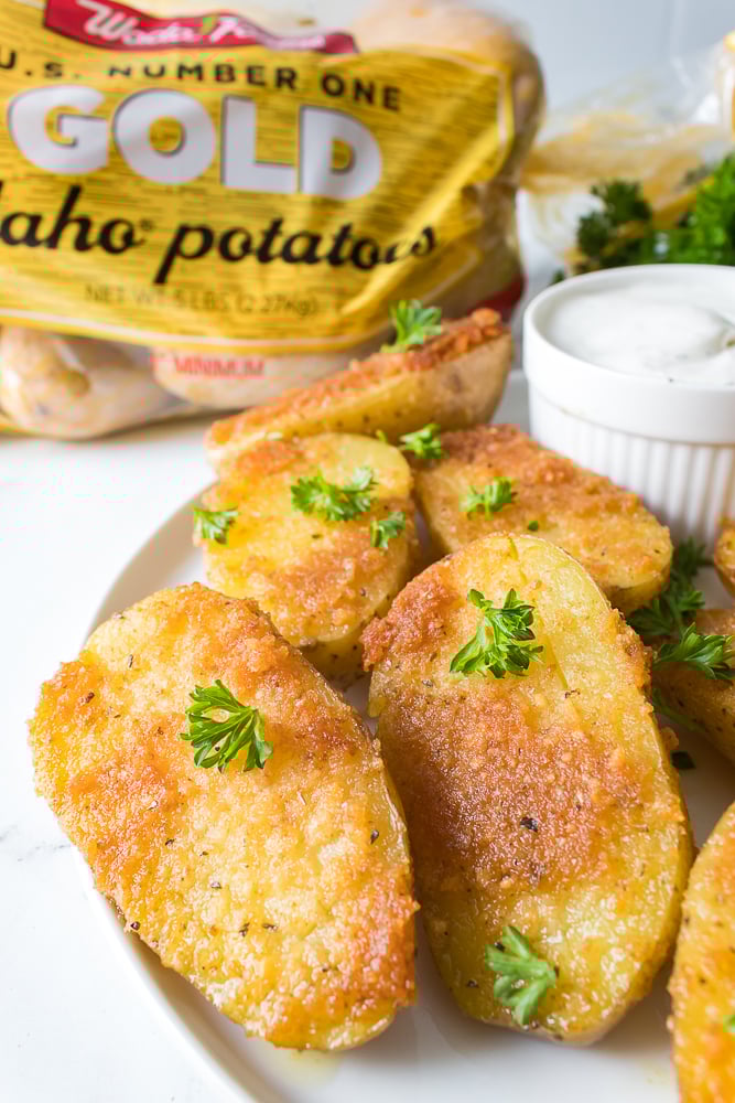 vertical close up shot of parmesan crust on oven roasted potato