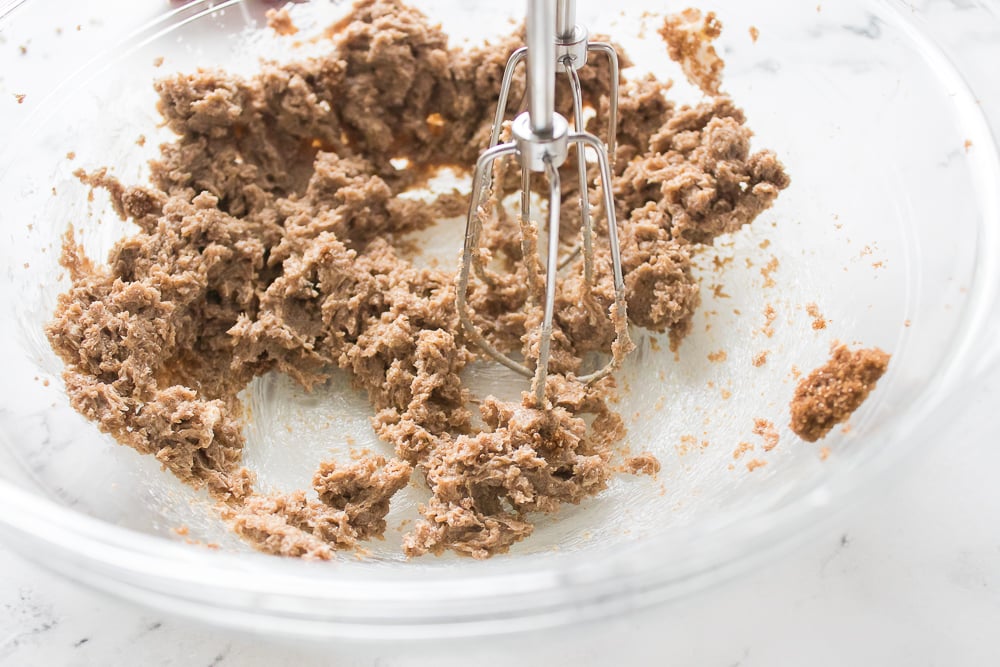 mixing bowl with butter and brown sugar being mixed