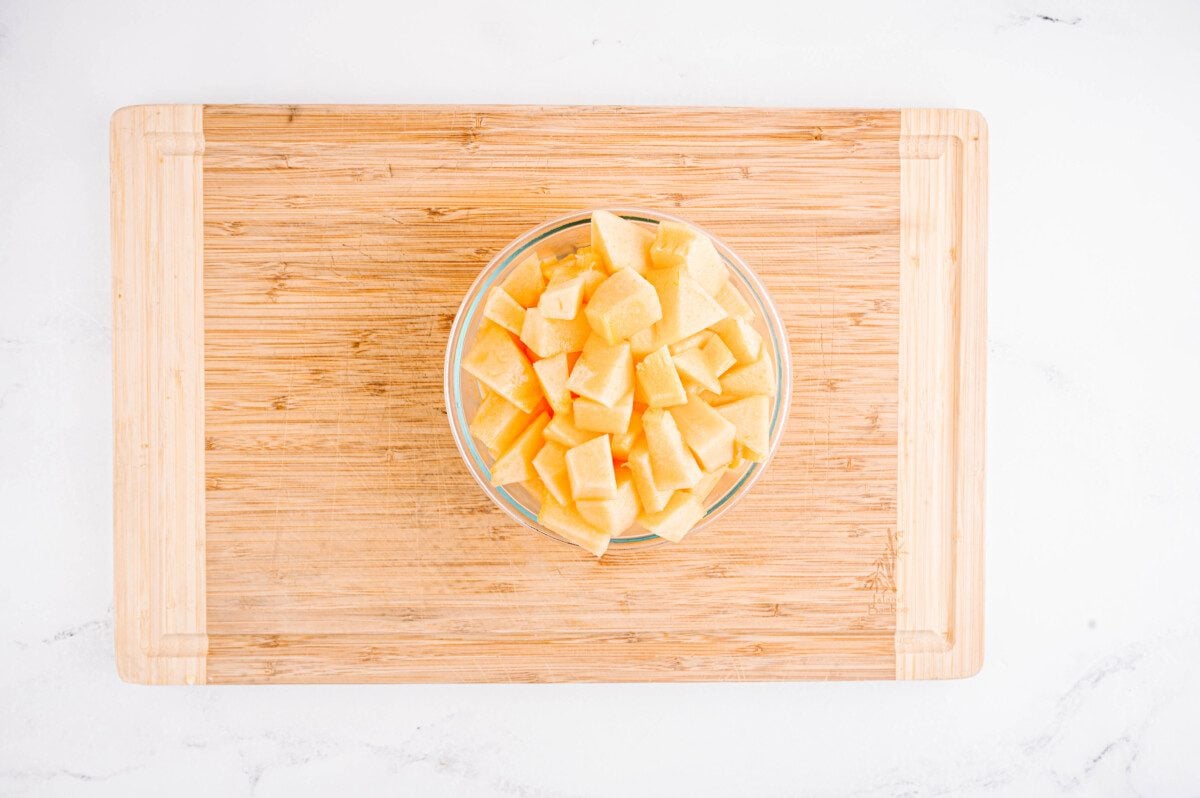 Cut cantaloupe into cubes.