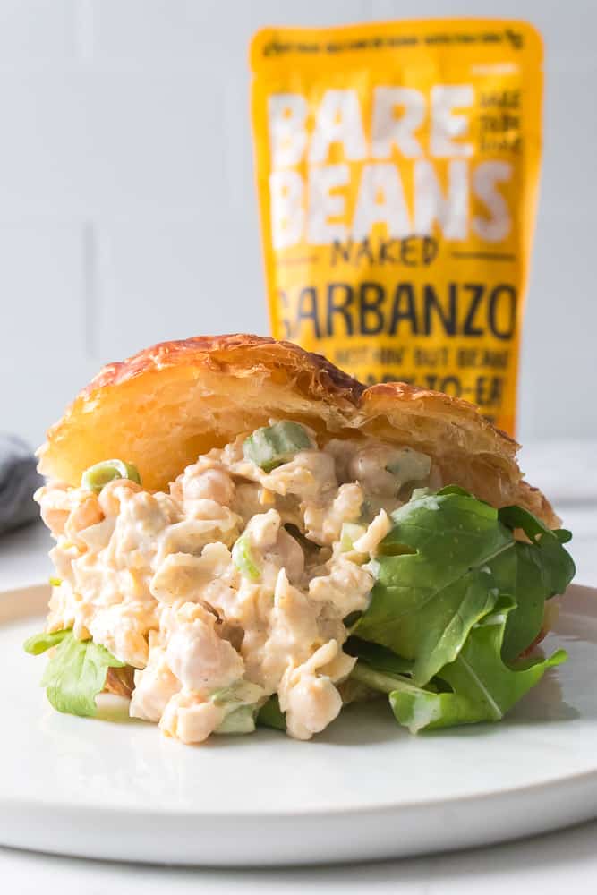 chickpea salad on a croissant with lettuce