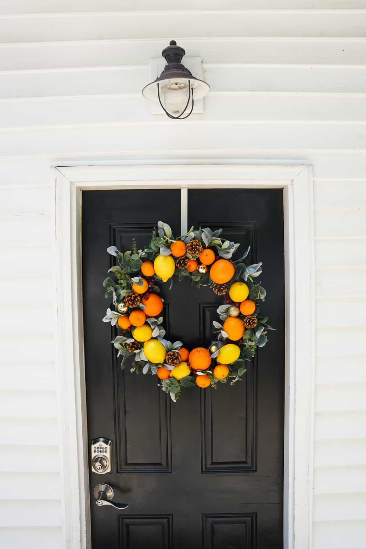 DIY Citrus Wreath hanging on the front door