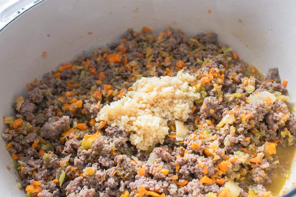 cooked hamburger with garlic, onions, carrots and celery