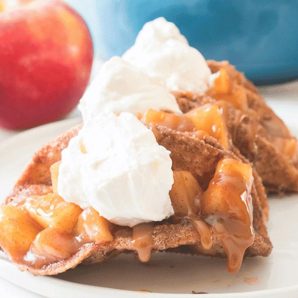 Apple Pie Tacos on a plate with apples in background