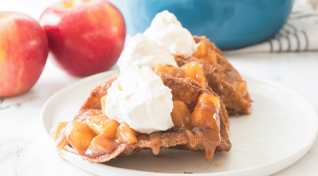 Apple Pie Tacos on a plate with apples in background