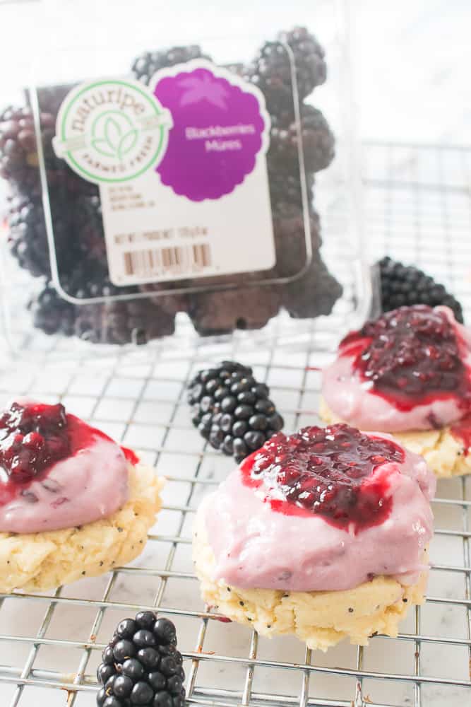 Copycat Crumbl Lemon Blackberry Cookie with Naturipe blackberry packaging in the background