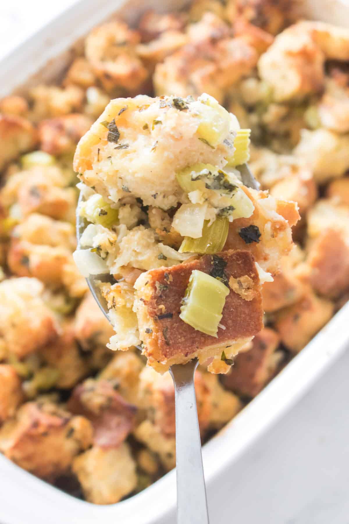 vertical image of homemade stuffing recipe on spoon
