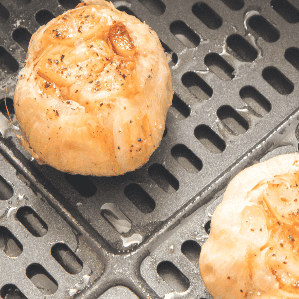 Close up of garlic in air fryer