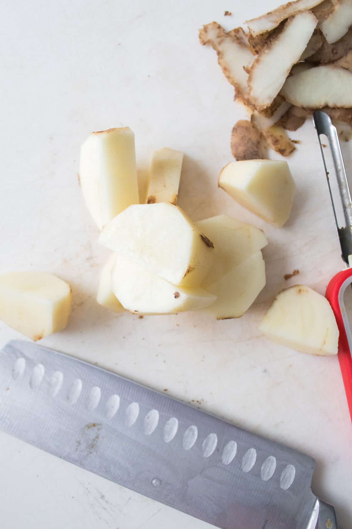 Cutting potatoes into chunks