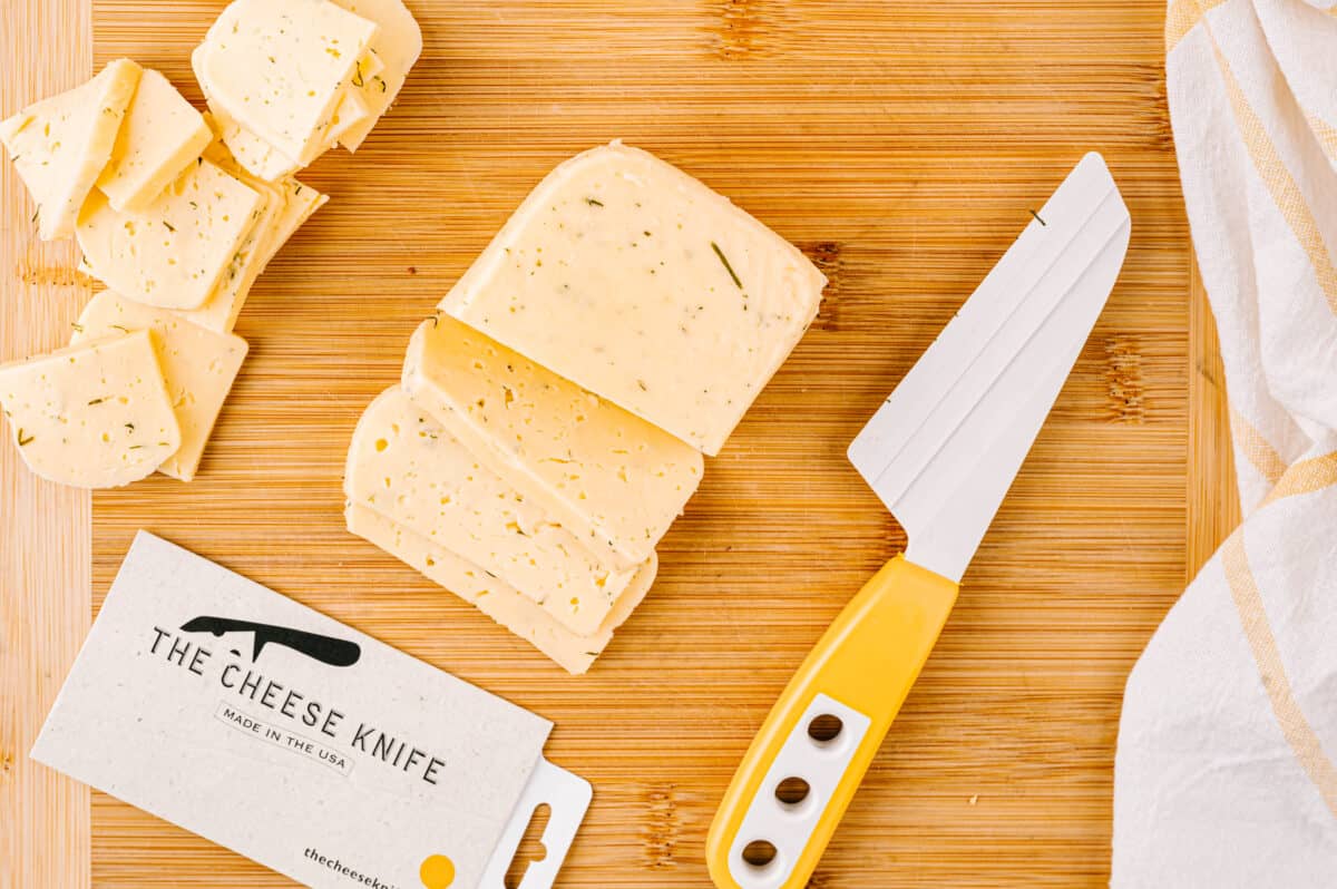 Cut hard cheese with The Cheese Knife.