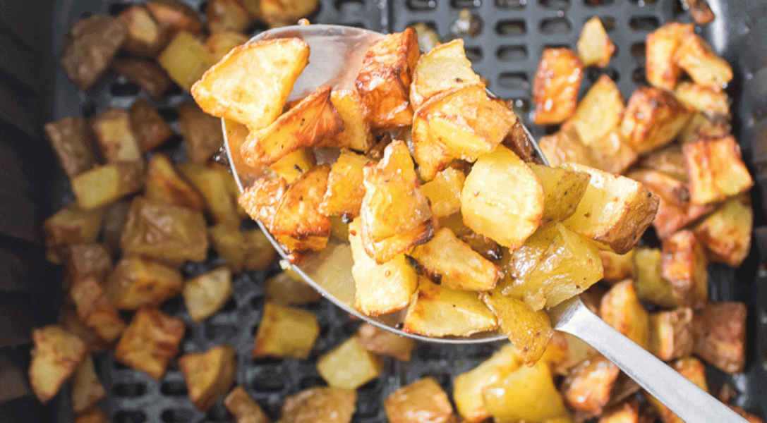 Spoonful of air fryer roasted potatoes