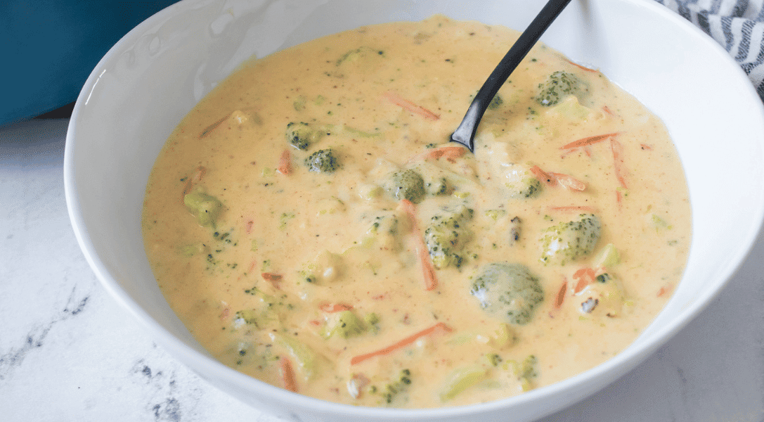 Broccoli Cheddar Soup in bowl with spoon