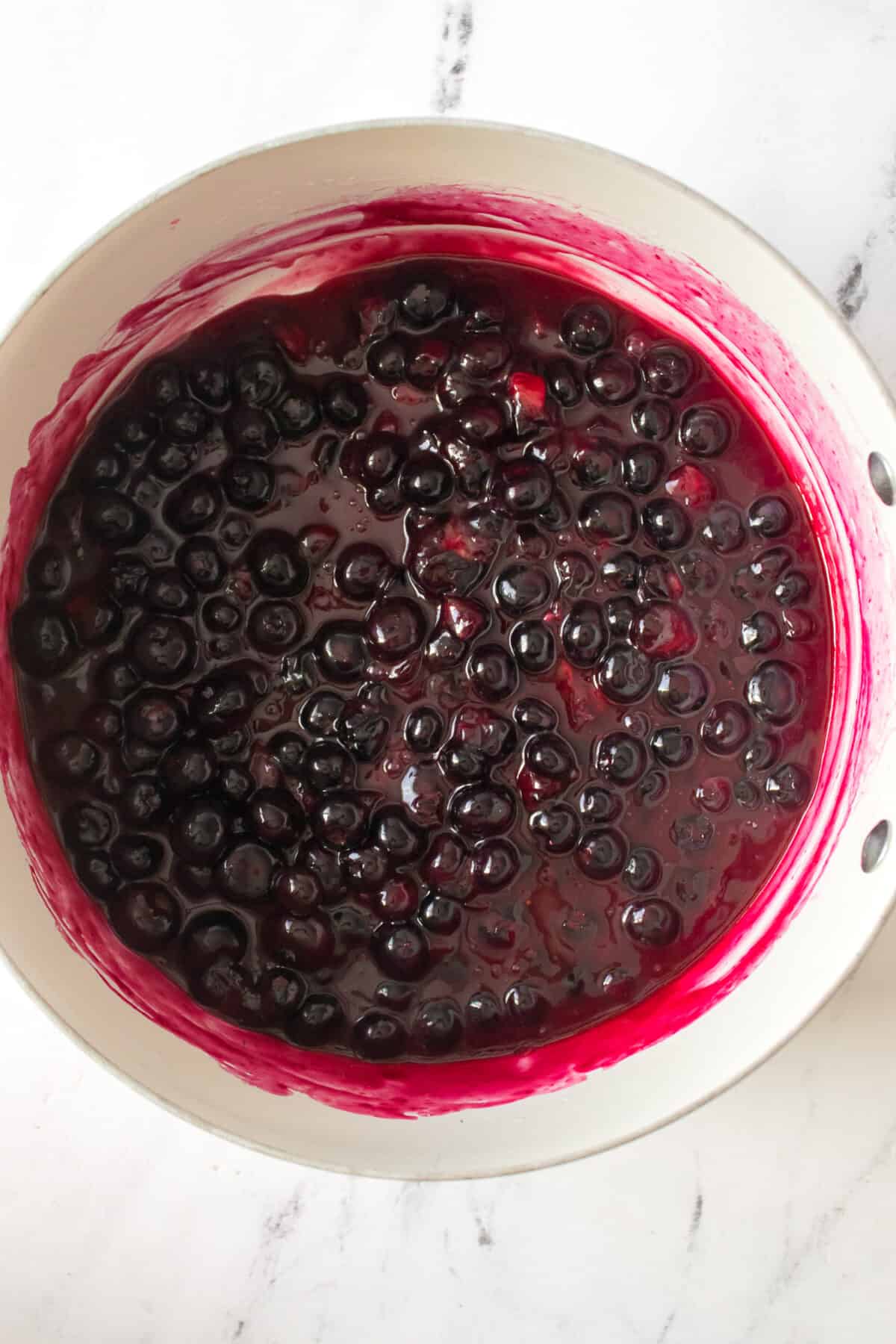 shot of blueberry sauce in pan