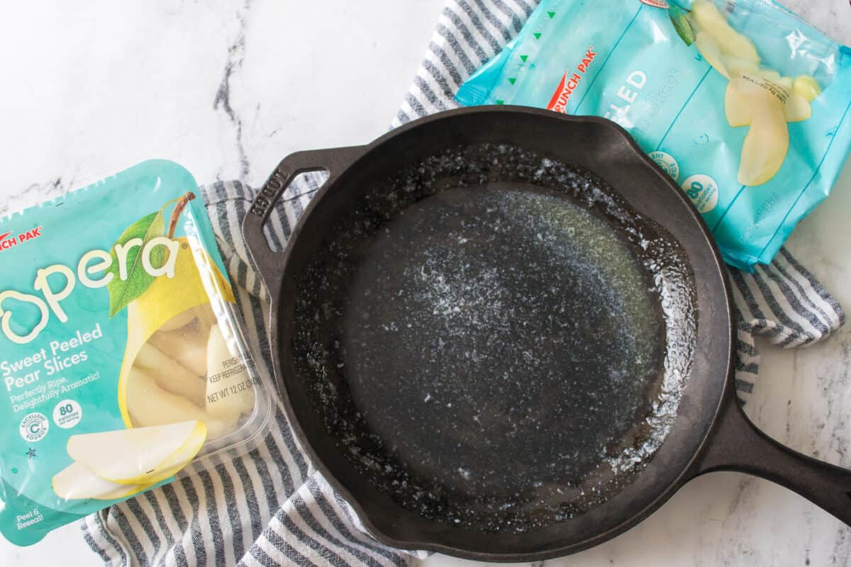 cast iron skillet with melted butter